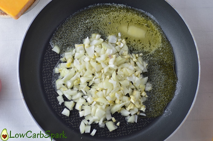 add the chopped onion in the keto melted butter