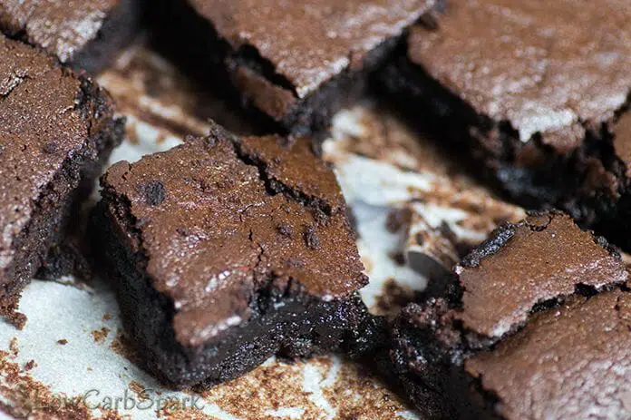 These super easy to make keto brownies are low carb, fudgy and have a dense creamy texture that melts in your mouth.