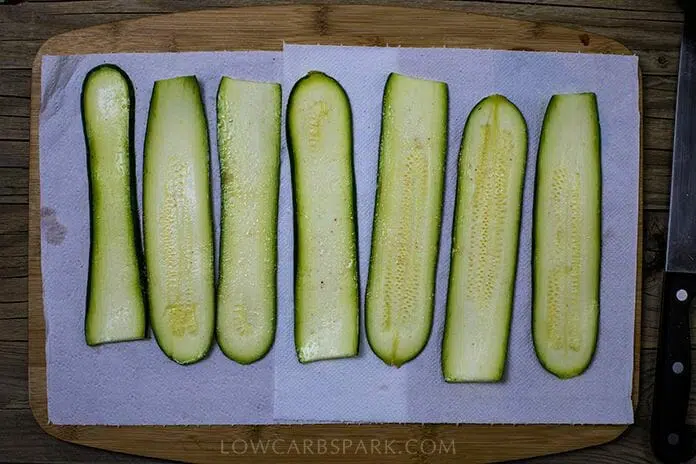 slice zucchini into thin slices using a mandoline
