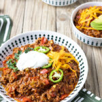 serving keto chili in a large plate