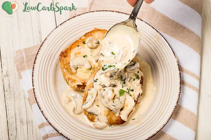 Keto Pork Chops with Creamy Mushrooms Sauce is perfect for a super easy dinner. It’s ready to serve in less than 30 minutes and needs simple low carb ingredients. Think infused creamy garlic and herbs mushroom sauce with tender and juicy pan-seared pork chops.