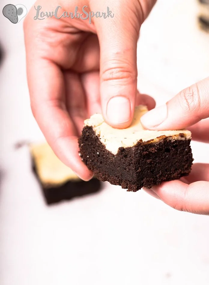 Keto Cheesecake Brownies 2 These Keto Cheesecake Brownies are the most delicious invention ever. Each square is insanely chocolatey, rich, fudgy and perfectly paired with a creamy cheesecake filling. And for only 1.5g carbs I think we have a pretty good deal!