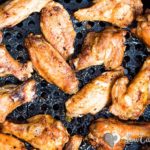 These Air Fryer Chicken Wings are super crispy, and the meat is juicy. Cooking Chicken Wings in an Air Fryer instead of deep frying makes them a healthy choice. This extremely popular recipe is ready 30 minutes and super easy to make! Toss them in a delicious low carb Buffalo sauce, and your meal is ready. #airfryer #chickenrecipes #airfryerrecipes #chickenwings