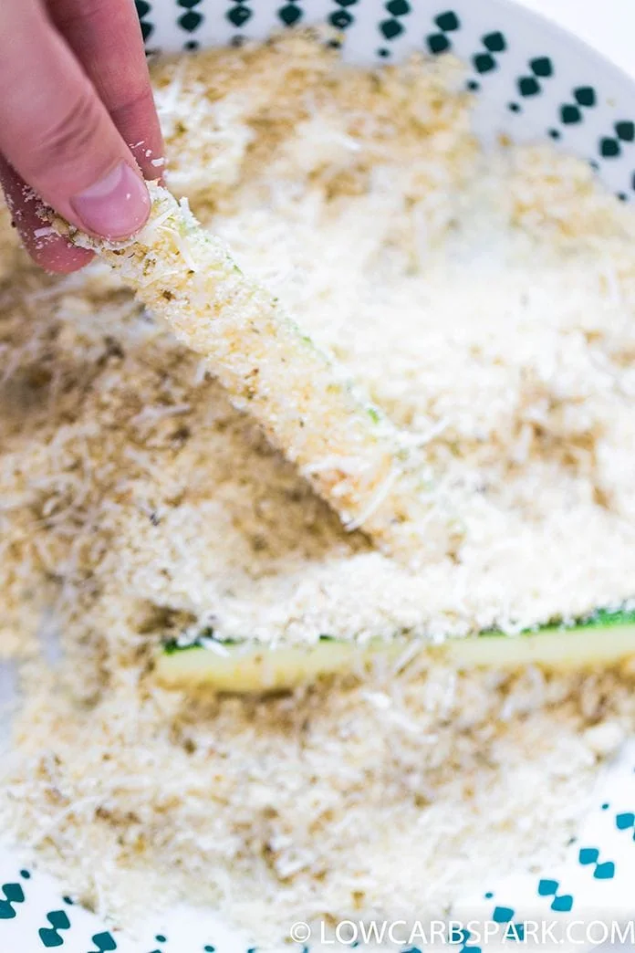 Crispy Parmesan Baked Zucchini Fries 3 coat zucchini fries with parmesan and almond flour