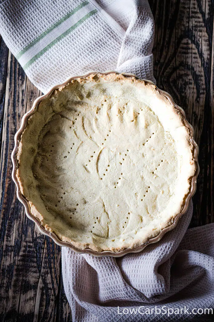 This savory keto pie crust is ready in less than 20 minutes, and it’s perfect for tarts, pies, and quiches. This grain-free crust is crispy, flakey and holds up well. Magic savory paleo crust made with just 5 ingredients!