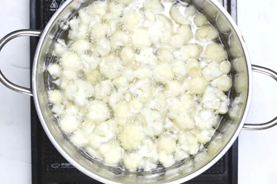 The Best Cauliflower Mac and Cheese 4 boil cauliflower in a large pot