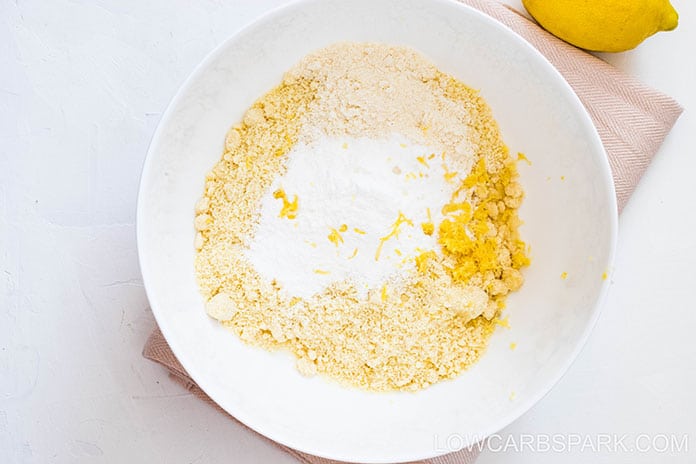These buttery lemon sugar-free cookies need only eight ingredients that you probably already have on hand. Here’s everything you’ll need:
·        almond flour
·        coconut flour
·        powdered sweetener
·        large egg 
·        baking powder 
·        lemon juice 
·        coconut oil
·        lemon zest 