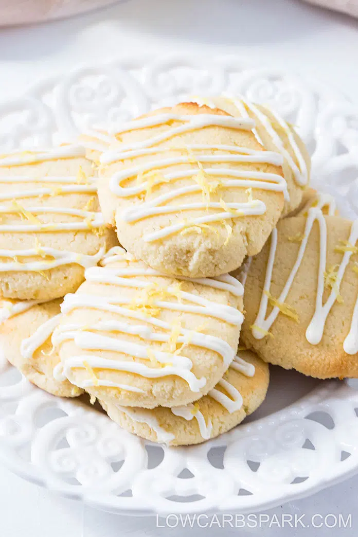 These sugar free lemon cookies are extremely soft on the inside, crispy on the outside and packed with lemon flavor. Drizzle them with my two ingredients keto lemon glaze and everyone will love them.