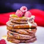 These gluten-free protein pancakes are packed chocolate flavor with no refined sugar or wheat flours. Enjoy a tall stack of fluffy protein pancakes that are low carb and keto-friendly.