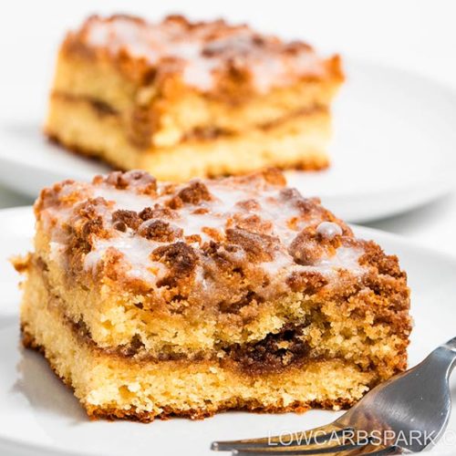 The Best Keto Coffee Cake Recipe that’s super decadent, moist, delightful, and easy to make in under 30 minutes. This is a crowd-pleasing coffee cake with a sweet cinnamon layer in the middle and a buttery, crispy streusel crumb topping. Top it off with my simple sugar-free glaze and enjoy with your morning coffee.