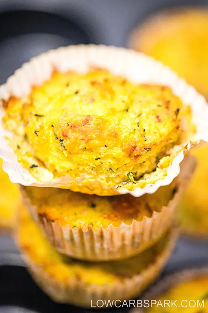 Zucchini Cheddar Cheese Savory Keto Muffins 5 Zucchini Savory Muffins are a super delicious, easy, on-the-go breakfast. They're moist, keto-friendly, and perfect for meal prepping. These keto zucchini muffins are buttery with a garlicky taste, moist inside, and the best crispy golden top.