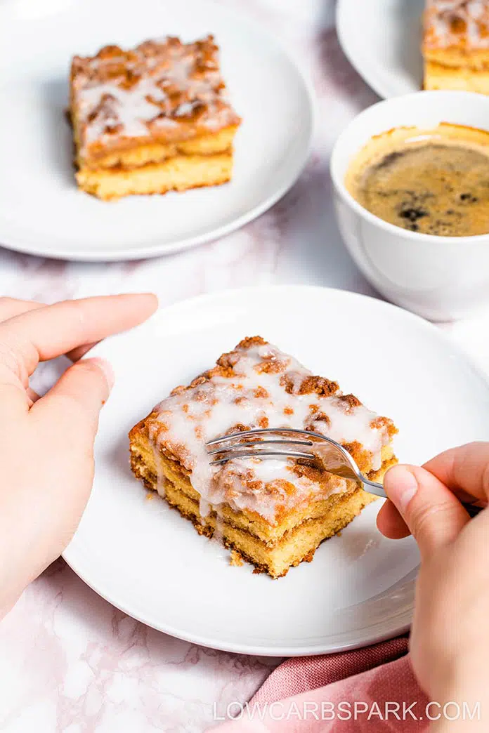 The Best Keto Coffee Cake Recipe that’s extremely moist, delicious and easy to make. Enjoy a crowd-pleasing coffee cake with a sweet cinnamon layer in the middle and a buttery, crispy streusel crumb topping. Top it off with my simple sugar-free glaze and enjoy with your morning coffee.
