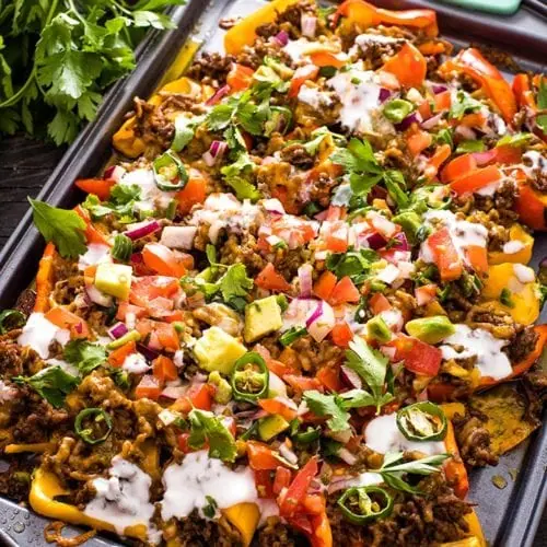 Low Carb Nachos with Mini Peppers - 6g Carbs 5 Low Carb Nachos with Mini Peppers are a fun and delicious way to enjoy loaded nachos without the carbs. Loaded nachos are easy to make, perfect for a party, Game Day, snack, or quick dinner.