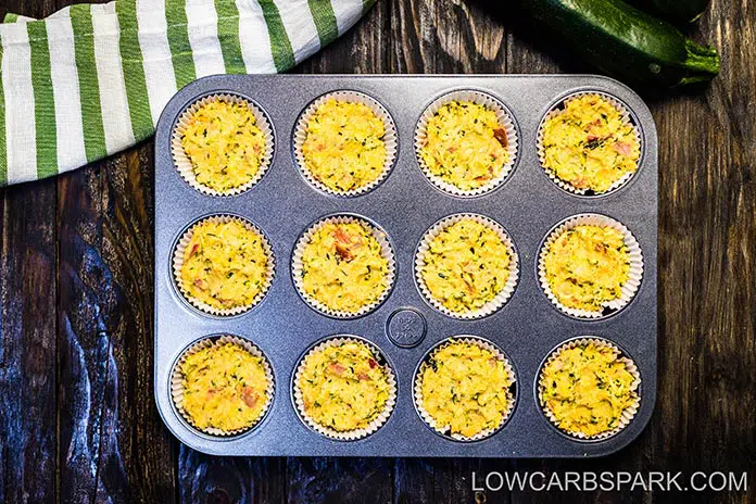 Zucchini Cheddar Cheese Savory Keto Muffins 3 Zucchini Savory Muffins are quick, on-the-go keto breakfast option. They're moist, keto-friendly, and perfect for meal prepping. These keto zucchini muffins are buttery with a garlicky taste, moist inside, and the best crispy golden top.