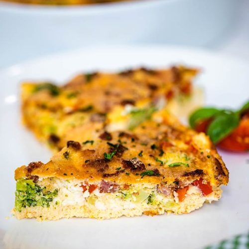 This easy vegetable frittata recipe with bacon and cheese is perfect for breakfast, quick lunch or light dinner! This is a great recipe for meal prep because it's quick to make in under 30 minutes.