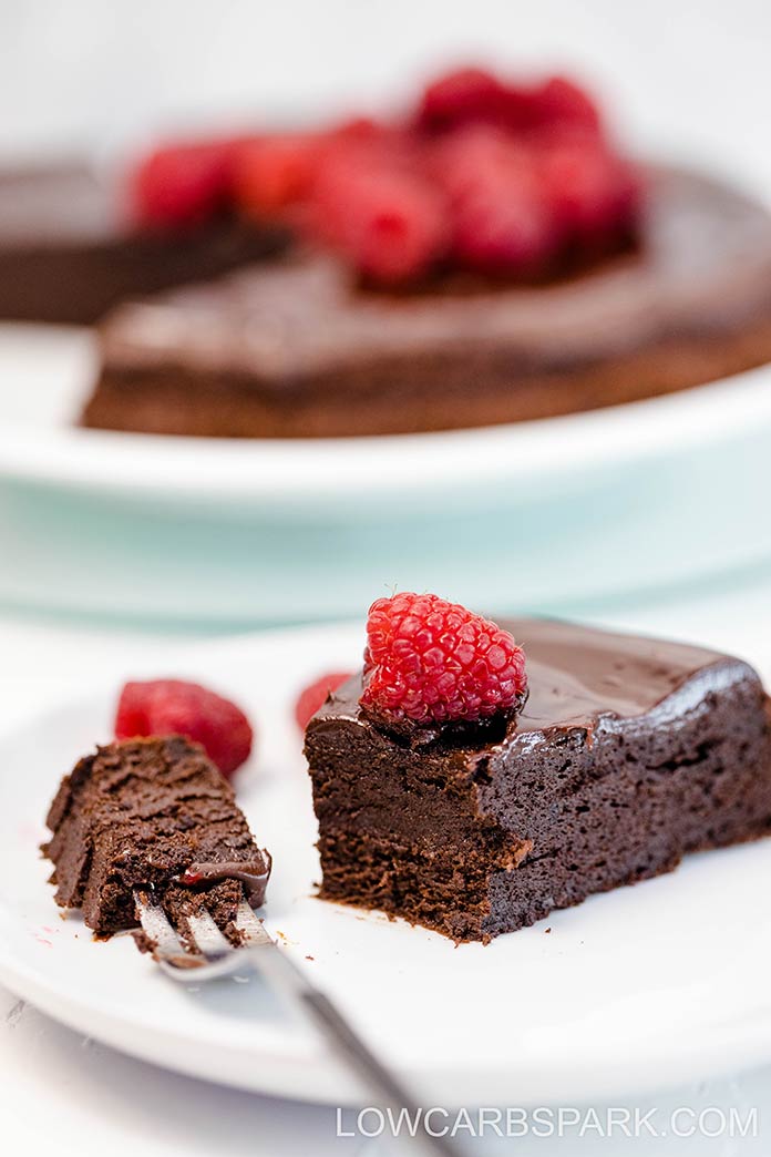 This decadent gluten-free flourless chocolate cake recipe is naturally keto and sugar-free. Make it for any special occasion when you want a sugar-free fudgy flourless cake.