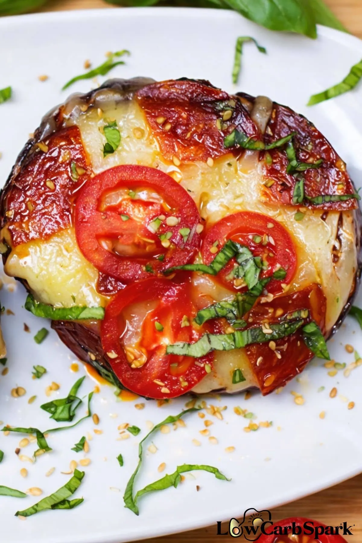 10-Minute Portobello Mushroom Pizza 1 Top view of portobello mushroom pizza with mozzarella and pepperoni