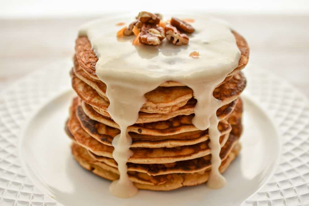 keto carrot pancakes topped with cream cheese sauce 2