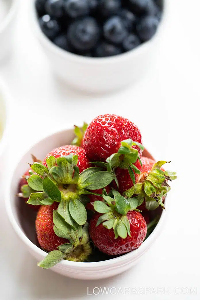 Keto Fruit Pizza with Cream Cheese Frosting - 4g net carbs! 5 strawberry and blueberry for keto pizza toppings