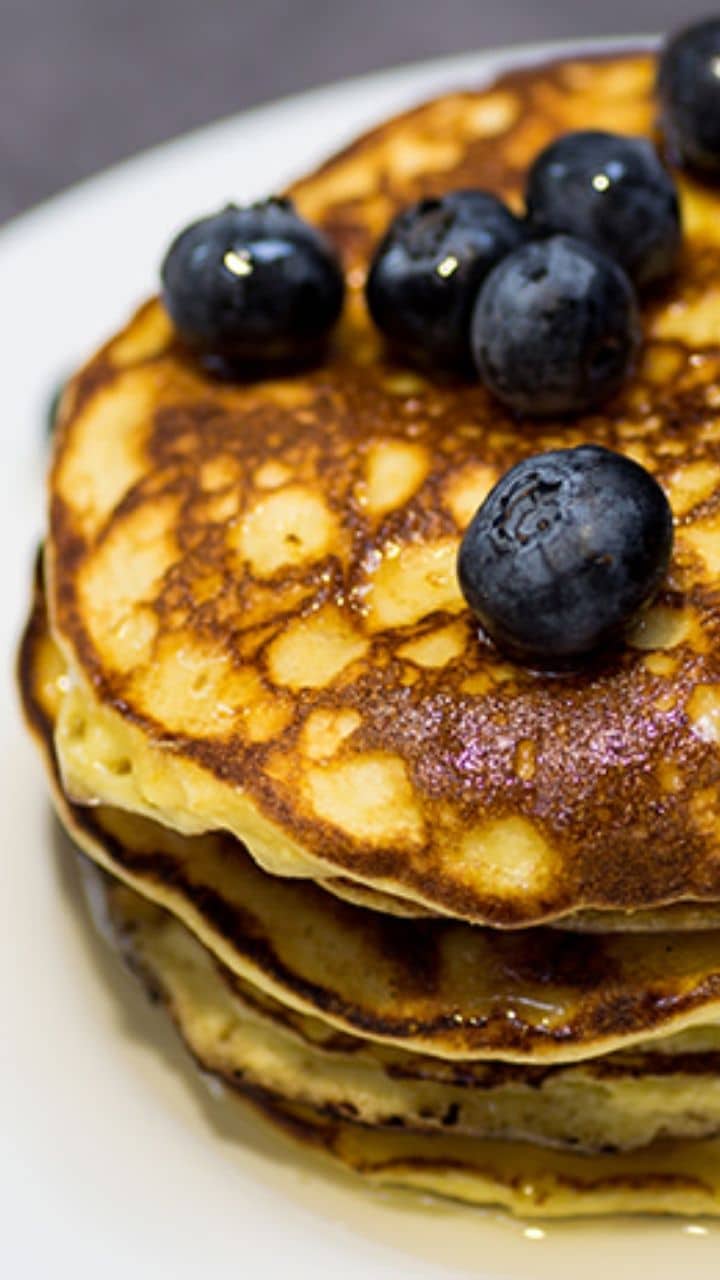 keto pancakes stack with blueberries on top