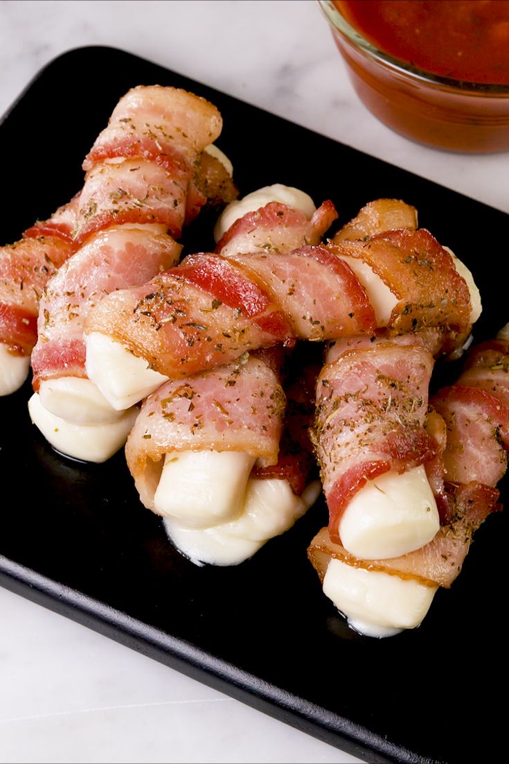 delish bacon wrapped mozzarella sticks pinterest still004 1553287758