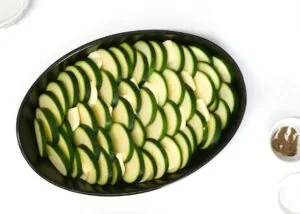 Best Zucchini Casserole - Super Creamy and Cheesy 12 arrange zucchini in a casserole dish