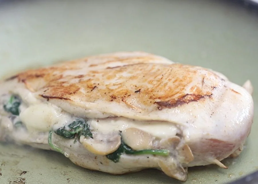 Creamy Mushroom and Spinach Stuffed Chicken Breast 7 sear chicken breast with mozzarella spinach and mushrooms