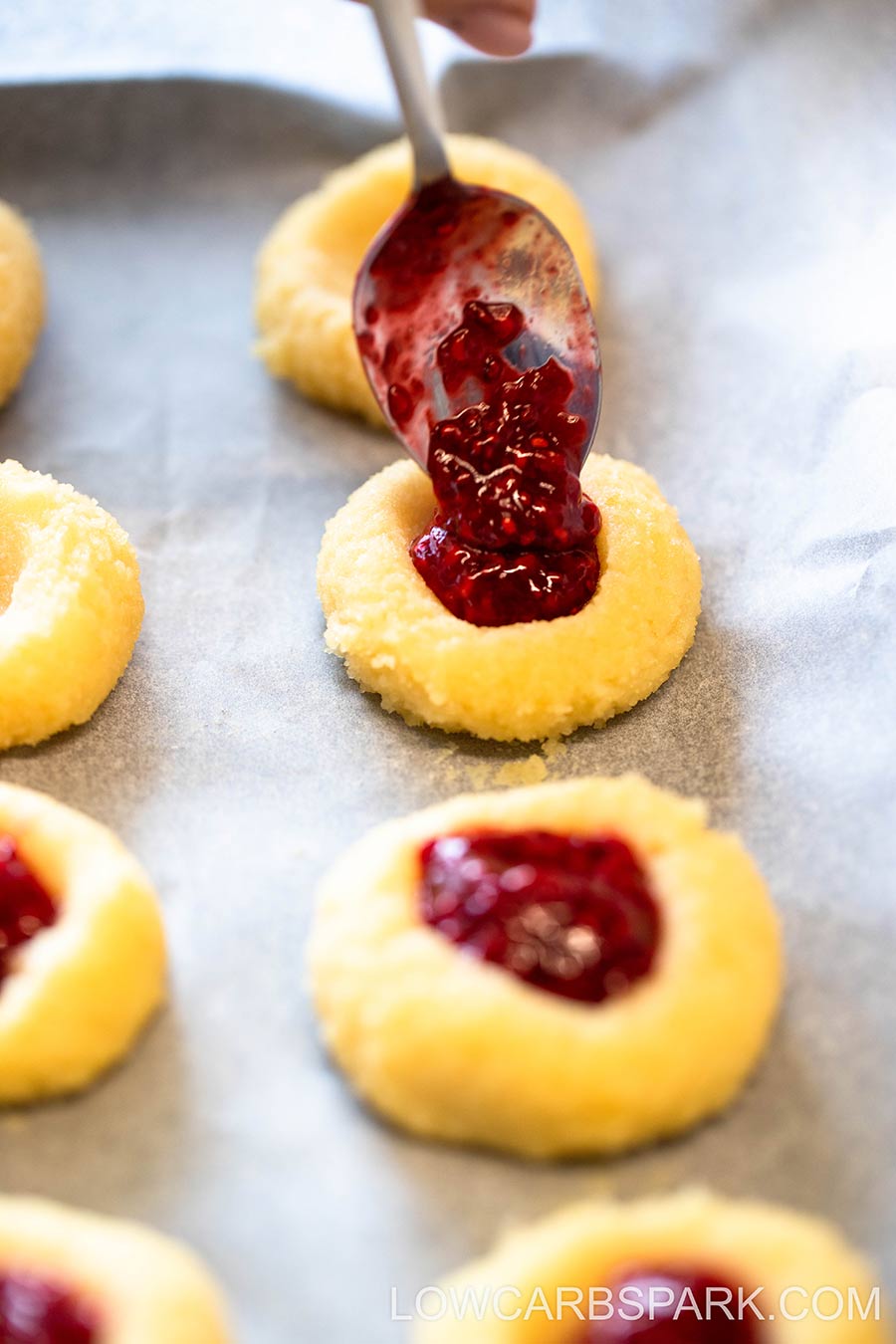 fill each cookie with jam
