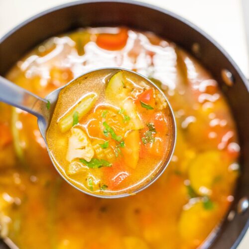 vegetable soup in a ladle