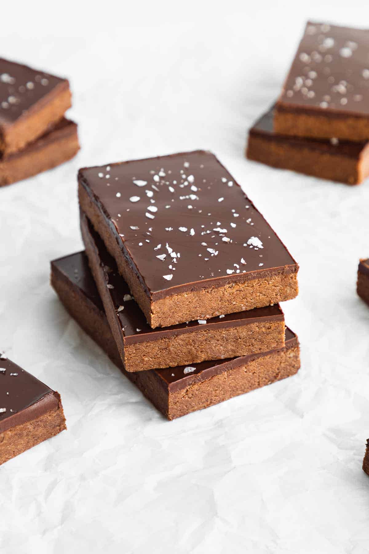 no bake chocolate protein bars stacked 2