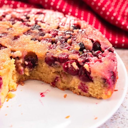 Cranberry Upside Down Cake on a white plate