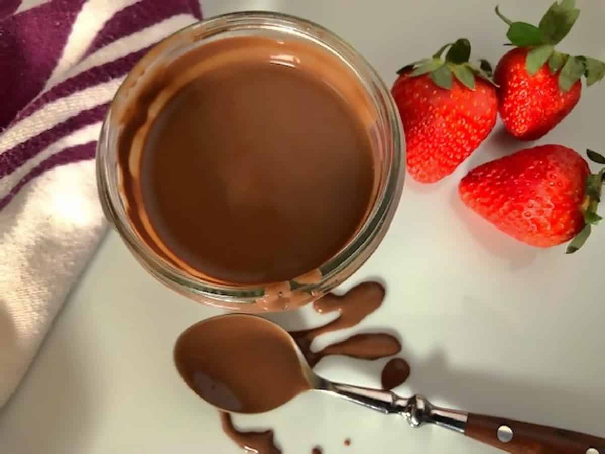 Chocolate sauce with spoon