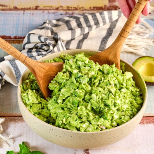 Green Goddess Salad 12 Tik Tok Green Goddess Salad in a bowl with serving spoons showing texture