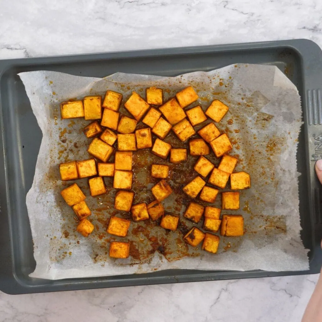 Roast Pumpkin Salad With Feta 5 roasted pumpkin on a baking tray