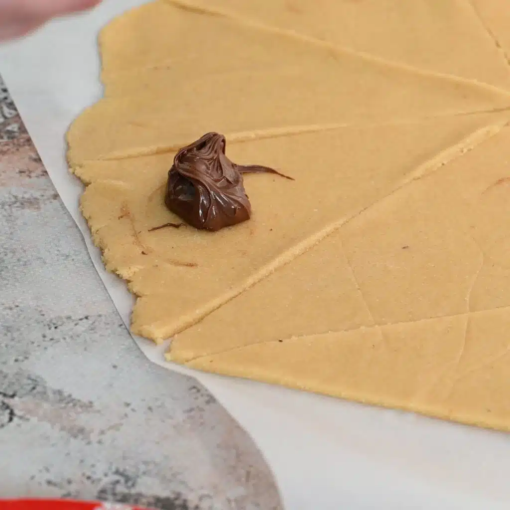 place chocolate filling on each piece of keto dough