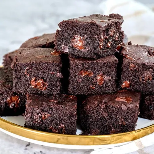 The Best Coconut Flour Brownies 9 coconut flour brownies squares on a plate