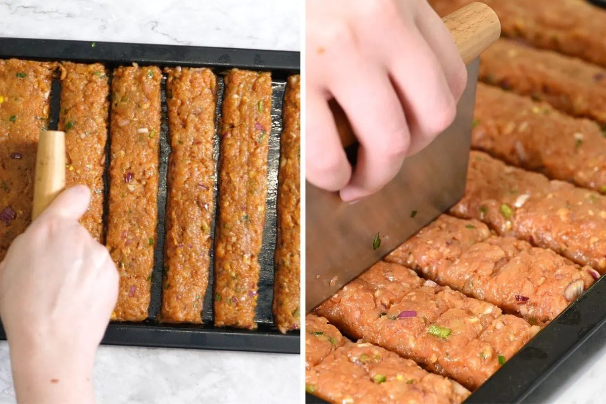 Sheet Pan Ground Chicken Kebabs 7 Slicing raw ground chicken kebab mixture into strip-shaped servings.