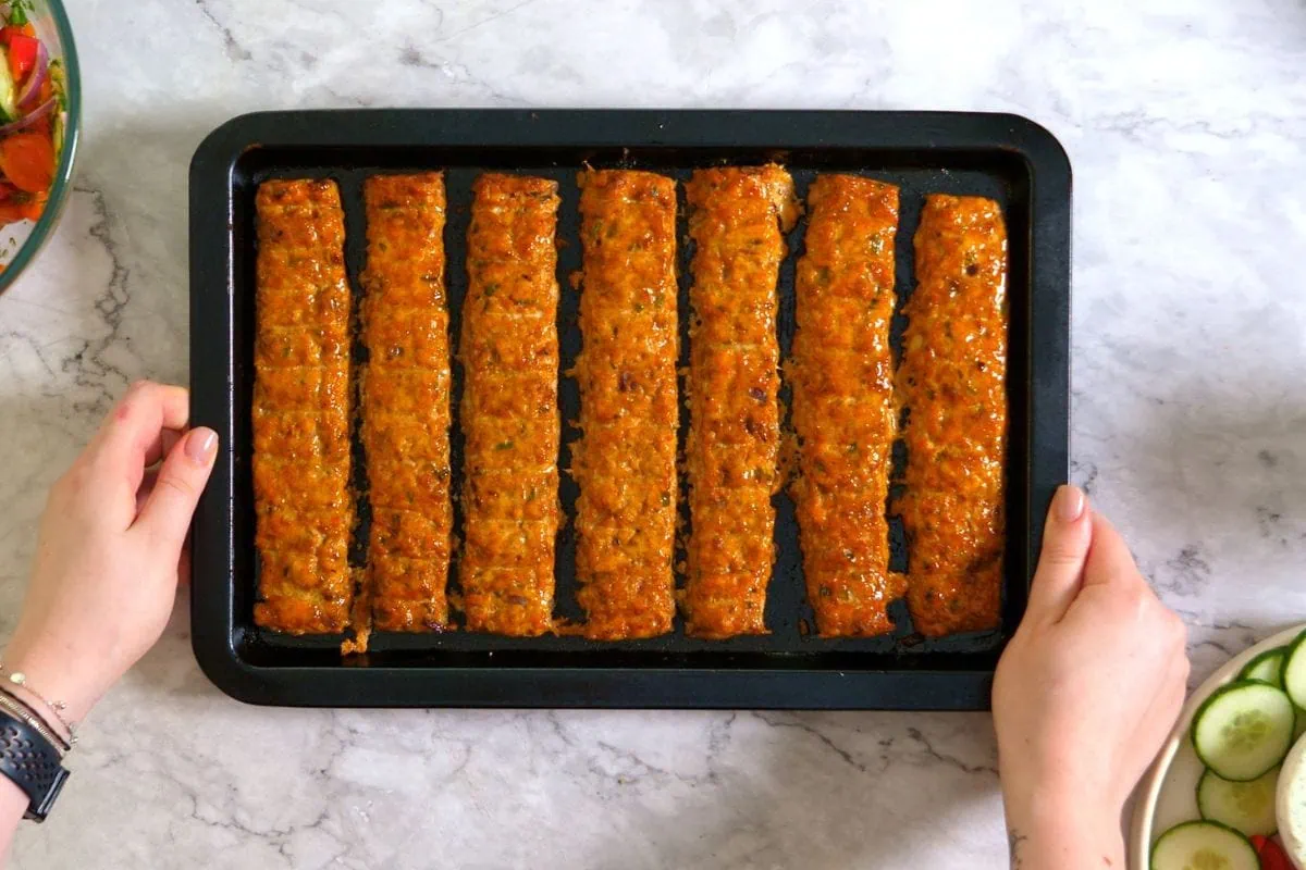 Sheet Pan Ground Chicken Kebabs 9 Baked golden-brown ground chicken kebabs straight from the oven.