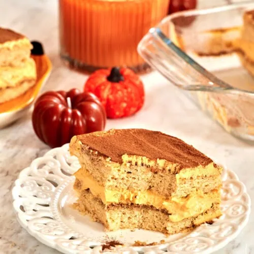 Gluten Free Pumpkin Tiramisu 13 Slice of gluten-free pumpkin tiramisu served on a white plate.