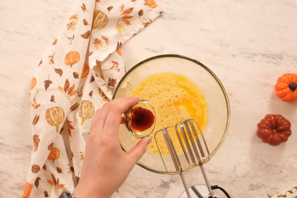 Gluten Free Pumpkin Tiramisu 5 Mixing vanilla extract with eggs and butter for almond flour cake.