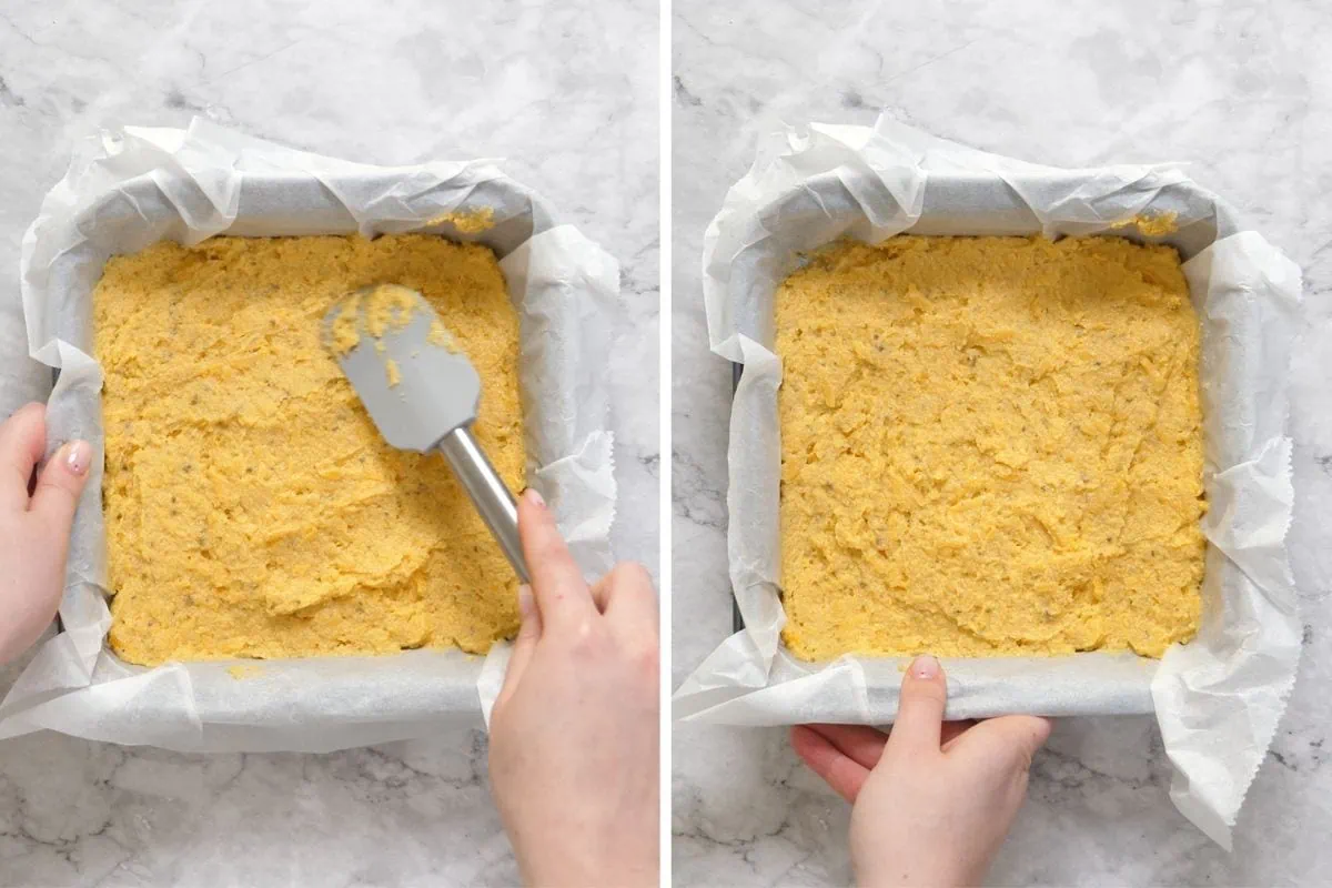 Keto Cheddar Bread 6 Spreading keto cheddar bread batter evenly into a parchment-lined baking pan