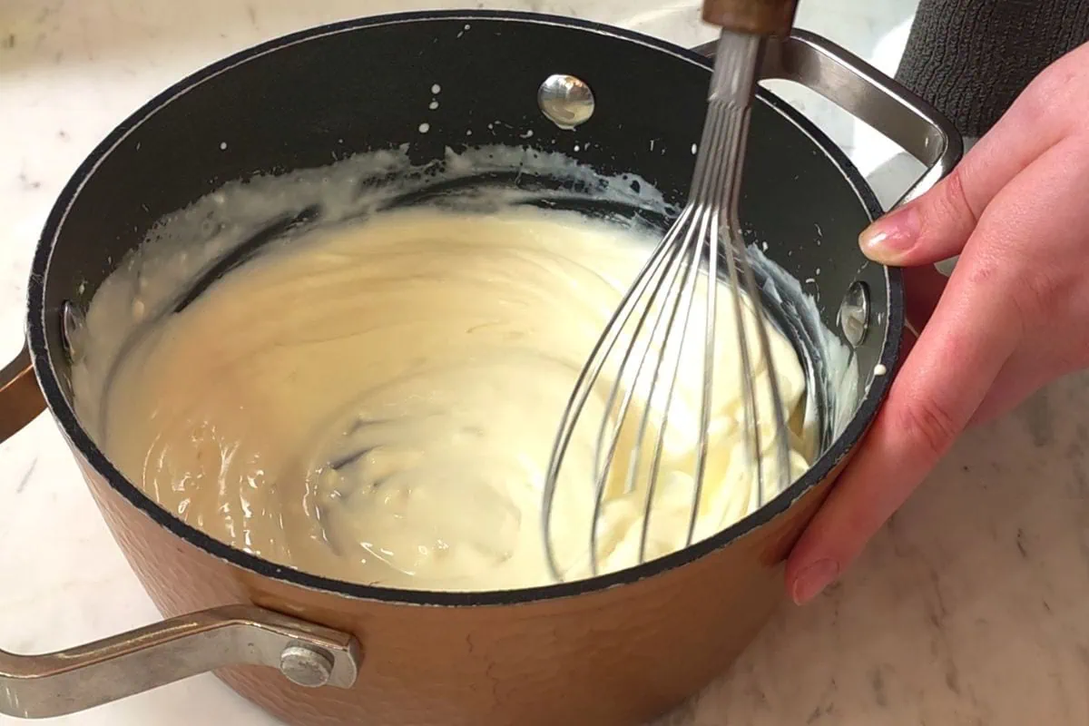 Creamy Turkey Soup 9 Preparing creamy base with heavy cream and cream cheese for turkey soup.