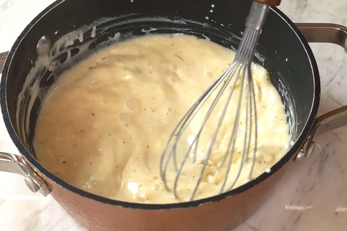 Creamy Turkey Soup 10 Whisking smooth cream base for hearty turkey soup.