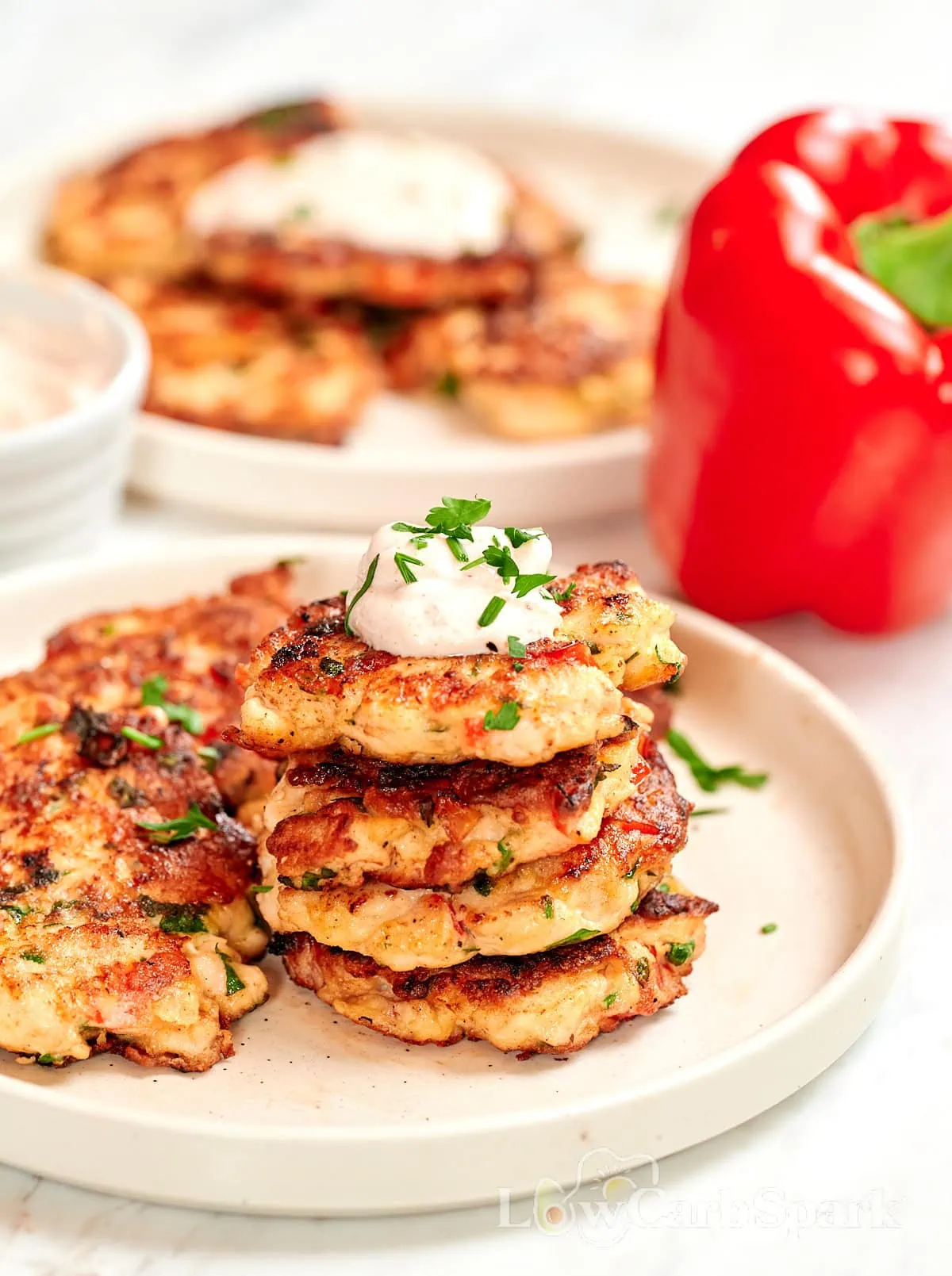 Cheesy Chicken Fritters 8 Stack of cheesy chicken fritters served with dipping sauce