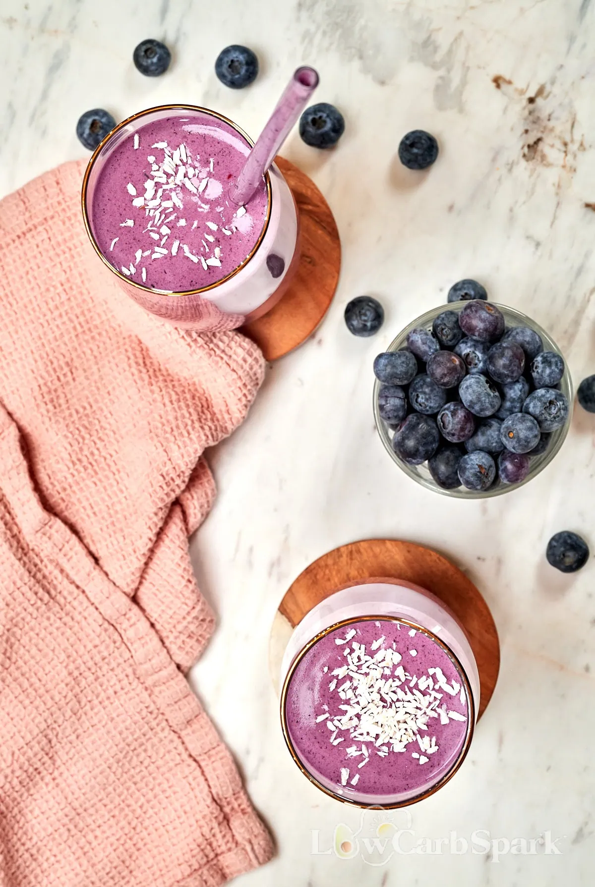 Cottage Cheese Blueberry Smoothie (High Protein!) 8 Top view of cottage cheese blueberry smoothies with coconut topping