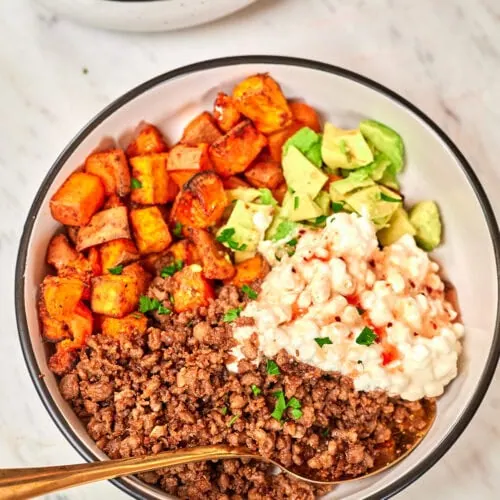Viral Hot Honey Ground Beef and Sweet Potato Bowl 10 Hot honey ground beef bowl with roasted sweet potatoes, avocado, and cottage cheese