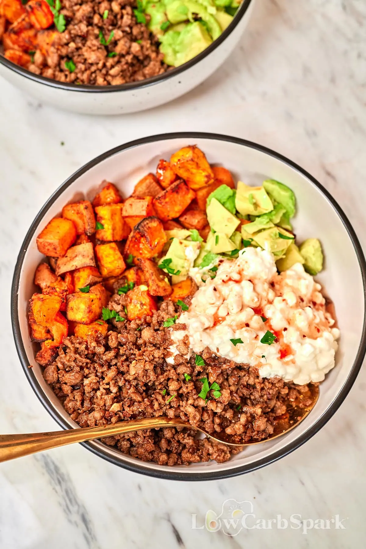 Viral Hot Honey Ground Beef and Sweet Potato Bowl 1 Hot honey ground beef bowl with roasted sweet potatoes, avocado, and cottage cheese