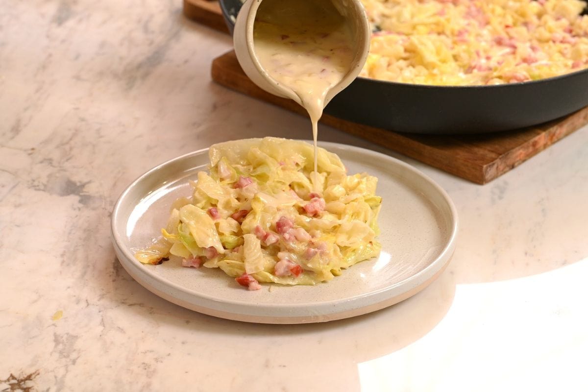 Cabbage Carbonara 9 Serving cabbage carbonara with creamy sauce