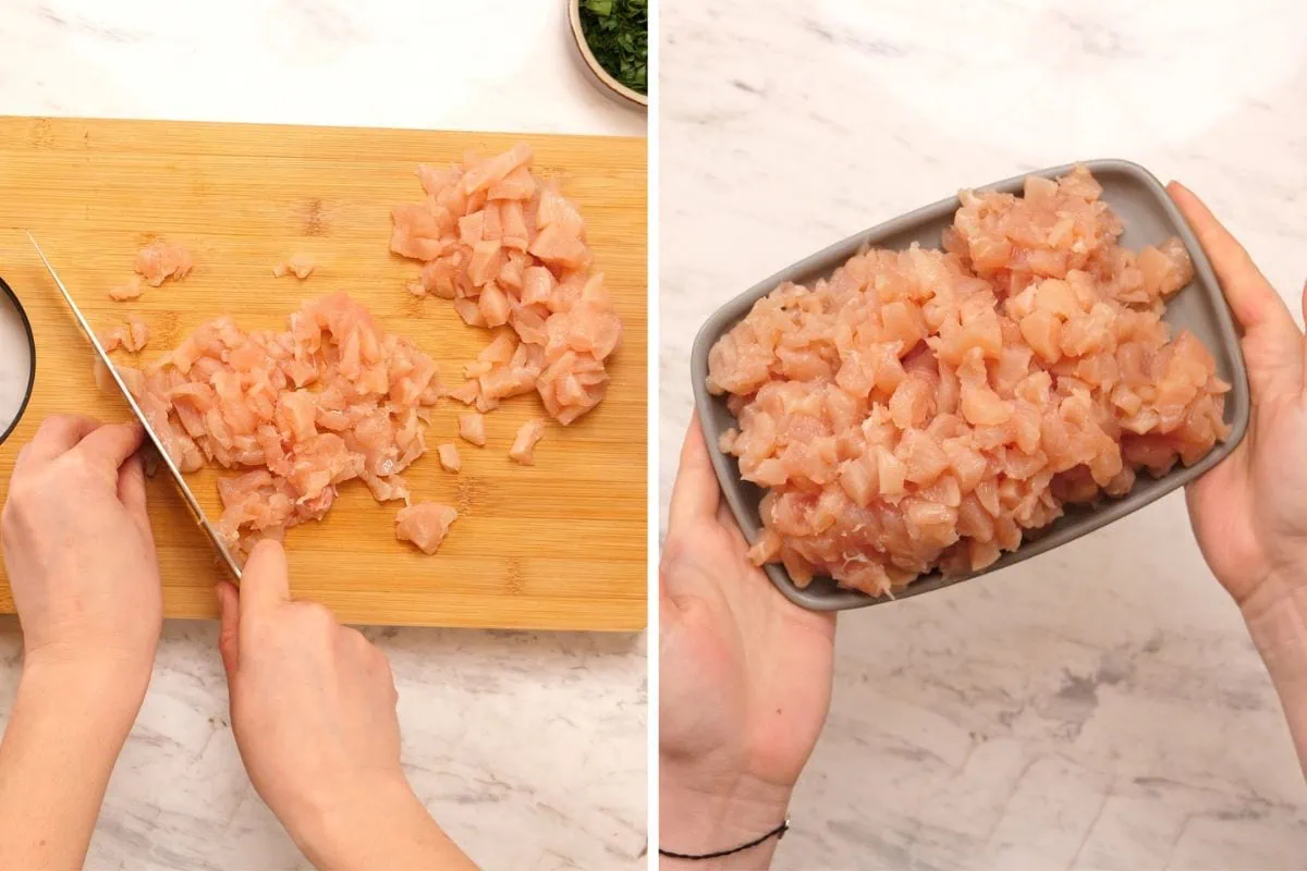 Cheesy Chicken Fritters 3 Chopping raw chicken breast for cheesy chicken fritters