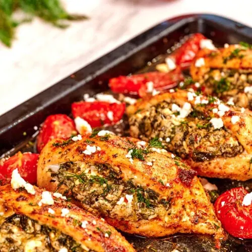 Spinach and Feta Stuffed Chicken Breast 11 Spinach and feta stuffed chicken breasts with roasted tomatoes and fresh dill